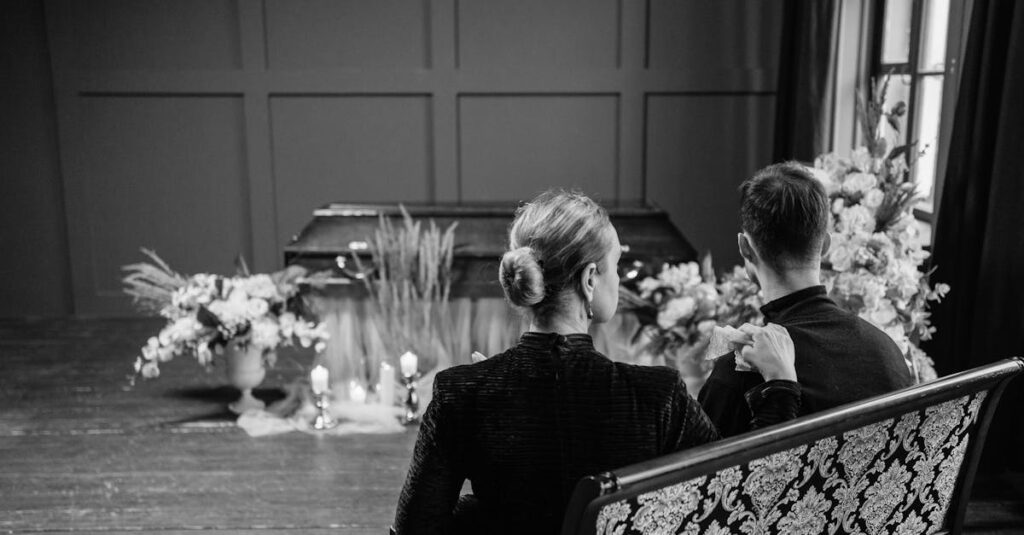 ペットの火葬における花の供え方。火葬前後に飾られた花と遺影のある落ち着いた空間。